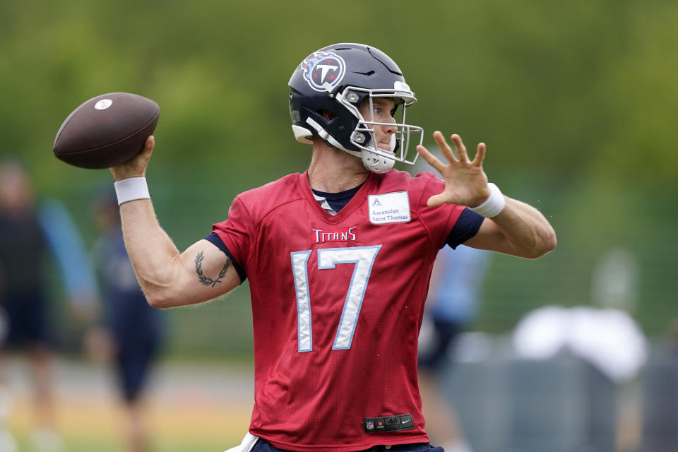 Tennessee Titans quarterback Ryan Tannehill takes part in a drill at the NFL football team's practice facility Tuesday, May 24, 2022, in Nashville, Tenn. (AP Photo/Mark Humphrey)