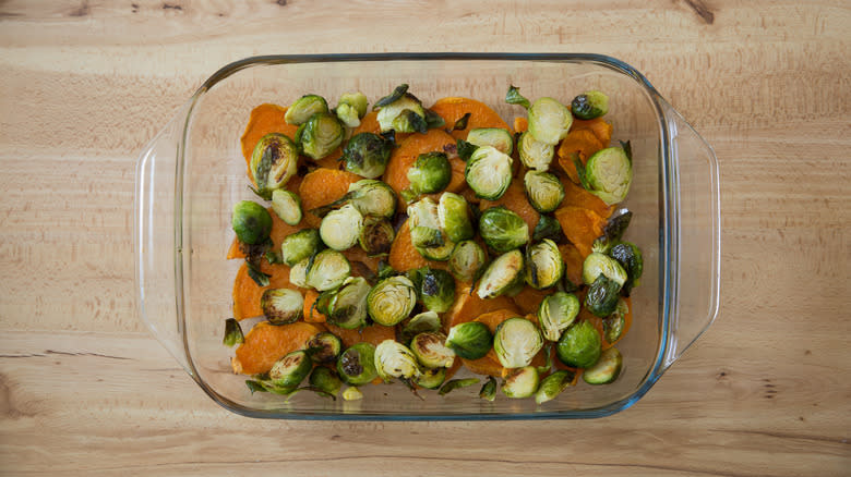 vegetables layered in baking dish 