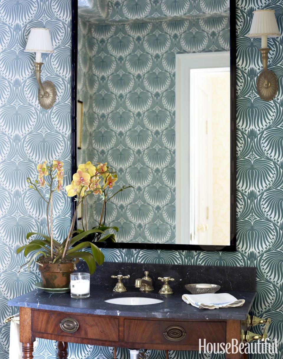 <p>Even the pattern-averse can get on board with a monochrome print. The powder room of a <a rel="nofollow noopener" href="https://www.housebeautiful.com/design-inspiration/house-tours/g3387/meg-braff-colonial-house-tour/" target="_blank" data-ylk="slk:New York colonial;elm:context_link;itc:0;sec:content-canvas" class="link ">New York colonial</a> features Farrow & Ball's Lotus wallpaper, but <a rel="nofollow noopener" href="https://www.housebeautiful.com/design-inspiration/house-tours/g3492/summer-thornton-naples-home-tour/?slide=6" target="_blank" data-ylk="slk:navy swirls;elm:context_link;itc:0;sec:content-canvas" class="link ">navy swirls</a> look just as nice. </p>