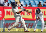 First Test cricket match - Saurashtra Cricket Association Stadium, Rajkot, India - 11/11/2016. India's Cheteshwar Pujara plays a shot. REUTERS/Amit Dave