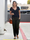 <p>Ali Fedotowsky makes her way to an office building in Los Angeles on Tuesday.</p>