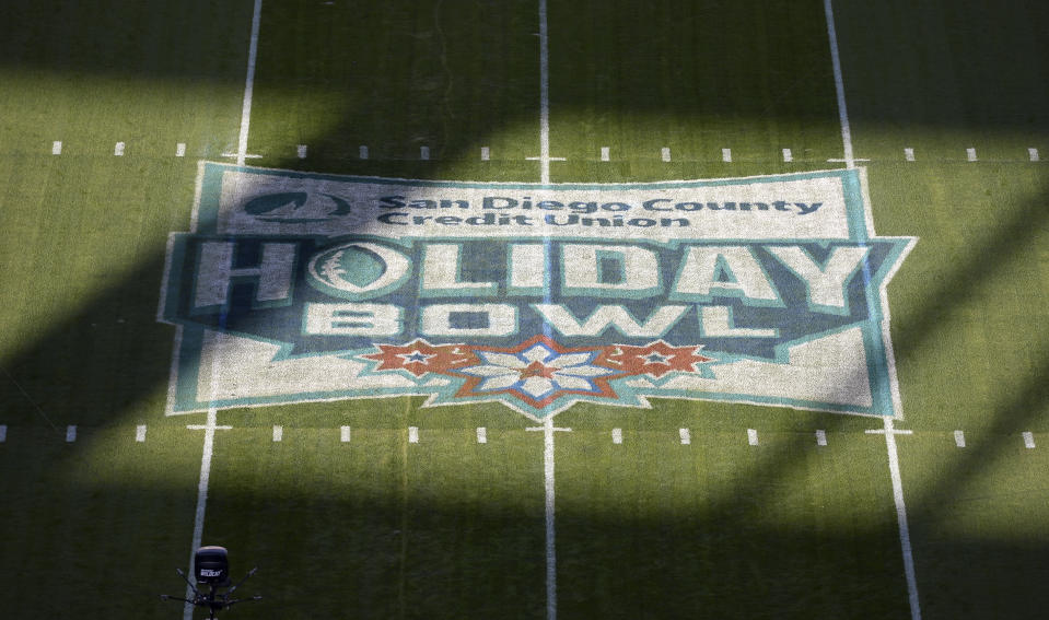 A detailed view of the midfield logo before the Holiday Bowl NCAA college football game between the USC Trojans and the Iowa Hawkeyes Friday, Dec. 27, 2019, in San Diego. (AP Photo/Orlando Ramirez)