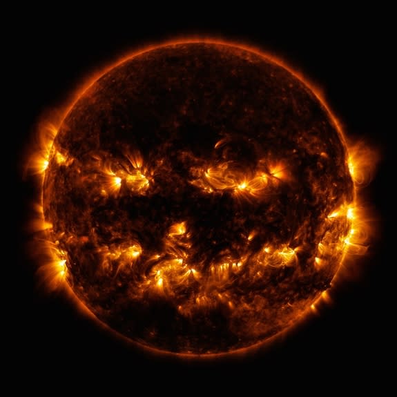 This image shows the sun shining like a jack-o-lantern. Image taken on Oct. 8, 2014.