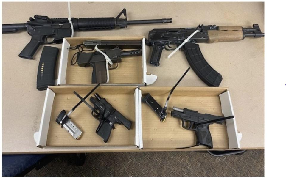 Akron police seized these five guns July 30 after stopping a car occupied by five teens in East Akron. One teen, 17, was arrested and charged.