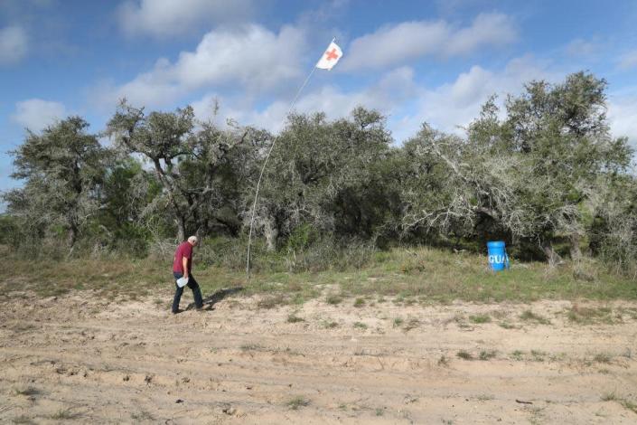 Immigrant rights activist Eddie Canales stocks remote water stations along migrant trails near Falfurrias, Brooks county, Texas.