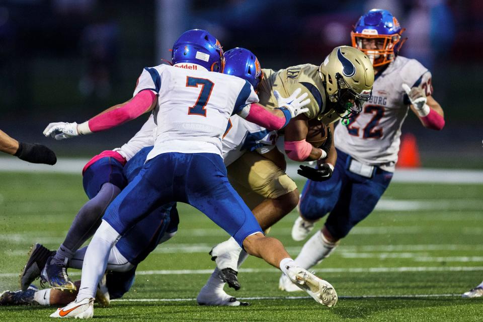 Niles’ Julian Means-Flewellen (1) runs with the ball during the Edwardsburg-Niles high school football game on Friday, October 06, 2023, at Viking Stadium in Niles, Michigan.