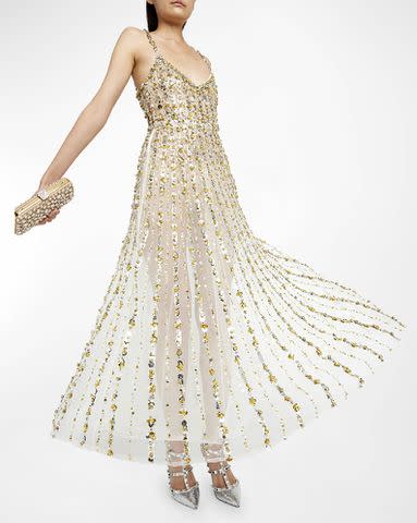 <p>Neiman Marcus</p> Valentino's sequin embroidered sheer cocktail dress in the color silver muli from their from their resort 2024 collection