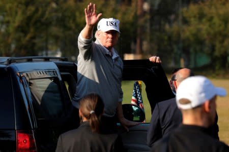 FILE PHOTO: U.S. President Donald Trump departs after a round of golf with Japan's Prime Minister Shinzo Abe at Kasumigaseki Country Club in Kawagoe, Japan November 5, 2017. REUTERS/Jonathan Ernst
