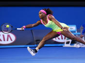 Serena Williams stretches to retrieve a forehand.