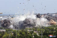 FILE - This photo provided by the North Korean government shows the demolition of an inter-Korean liaison office building in Kaesong, North Korea on June 16, 2020. The content of this image is as provided and cannot be independently verified. Korean language watermark on image as provided by source reads: "KCNA" which is the abbreviation for Korean Central News Agency. (Korean Central News Agency/Korea News Service via AP, File)
