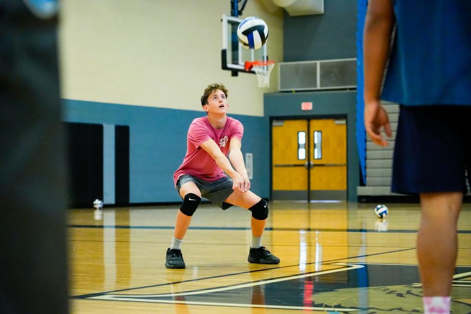 Libero Jace Carrol passes during practice with the Estrella Foothills boys' volleyball team on March 27, 2023, in Goodyear, Ariz.