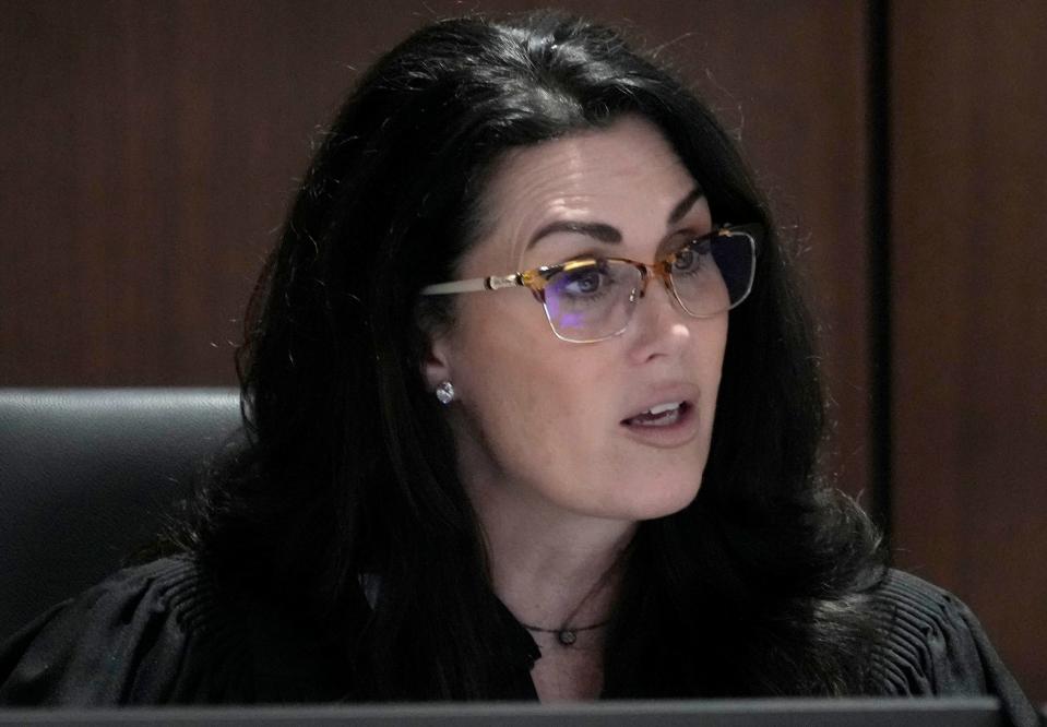 Waukesha County Circuit Court Judge Jennifer Dorow talks with Darrell Brooks during his sentencing scheduling hearing on Monday. Last week, a jury returned 76 guilty verdicts against Brooks in the November 2021 Waukesha Christmas Parade attack, killing six people and injuring dozens more.