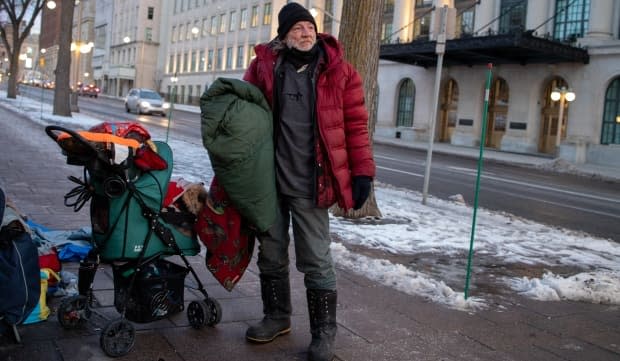 CBC photographer Andrew Lee captured thousands of images in the past year, many focusing on poverty, including this picture of a homeless man on Wellington Street in Ottawa. 