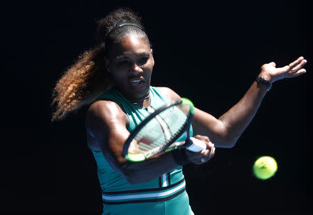 Tennis - Australian Open - Quarter-final - Melbourne Park, Melbourne, Australia, January 23, 2019. Serena Williams of the U.S. in action with Czech Republic's Karolina Pliskova. REUTERS/Edgar Su