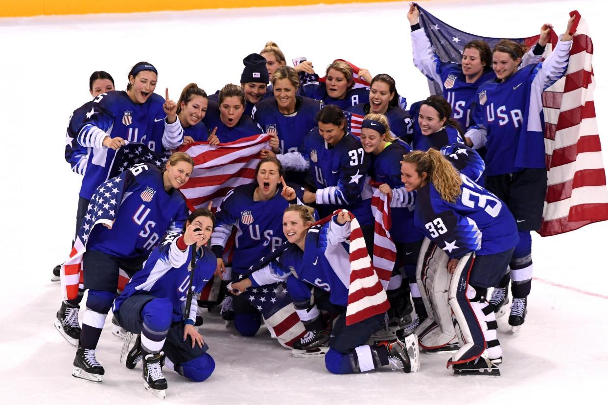 The United States celebrates after defeating Canada in a shootout to win the Women's Gold Medal: Harry How/Getty Images