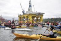 Activists protest the Shell Oil Company's drilling rig Polar Pioneer which is parked at Terminal 5 at the Port of Seattle, Washington May 16, 2015. REUTERS/Jason Redmond