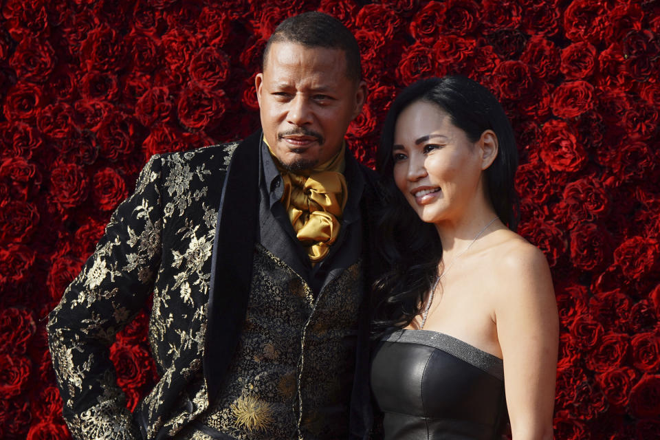 Terrence Howard and Miranda Pak pose for a photo on the red carpet at the grand opening of Tyler Perry Studios on Saturday, Oct. 5, 2019, in Atlanta. (Photo by Elijah Nouvelage/Invision/AP)