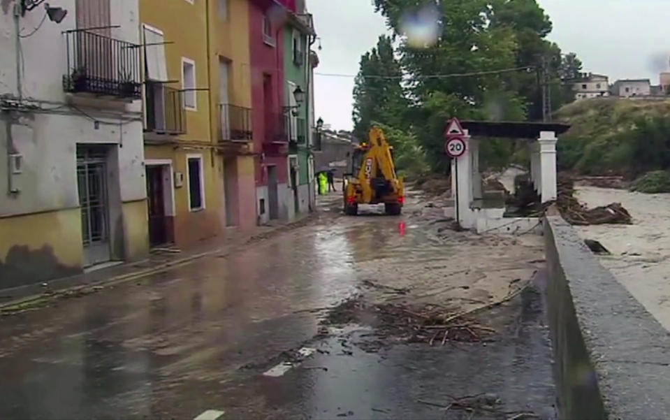 In this image made from video provided by Atlas, the flooded streets are seen in Ontiyente, Spain, Thursday, Sept. 12 2019. A large area of southeast Spain was battered Thursday by what was forecast to be its heaviest rainfall in more than a century, with the storms wreaking widespread destruction and killing at least two people. (Atlas via AP)