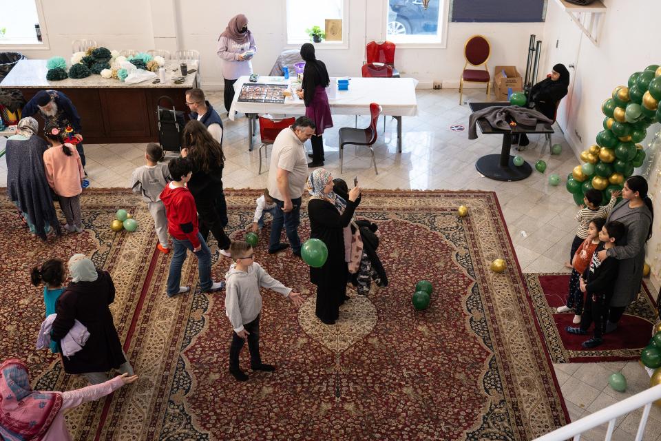 A gathering mingled during the Eid festival held Saturday at the Worcester Islamic Center.