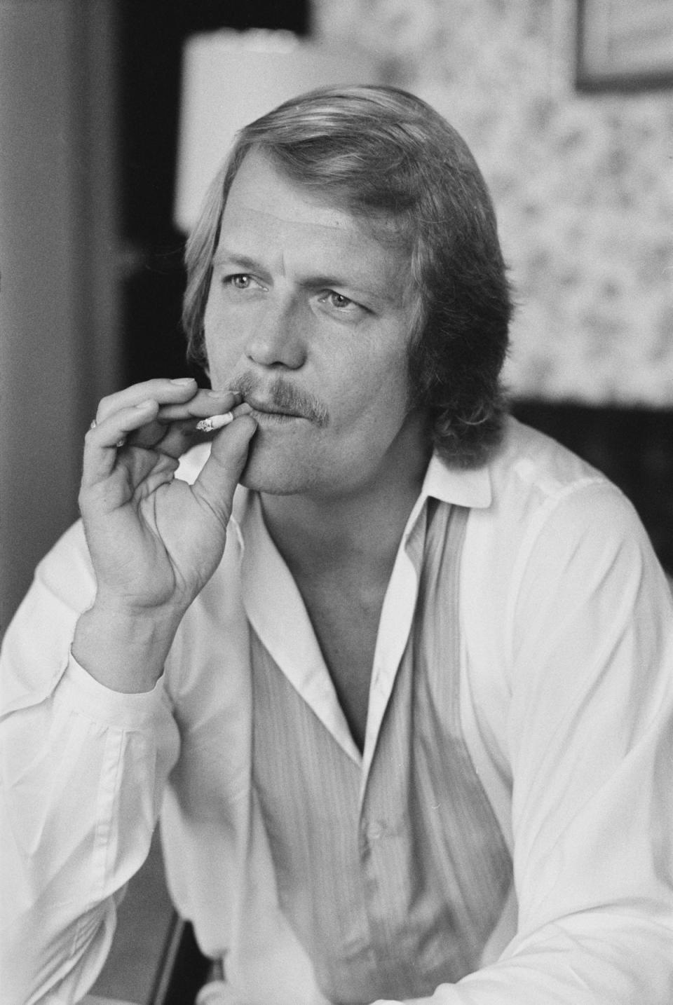 American actor David Soul smoking a cigarette, UK, 18th May 1978. (Getty Images)