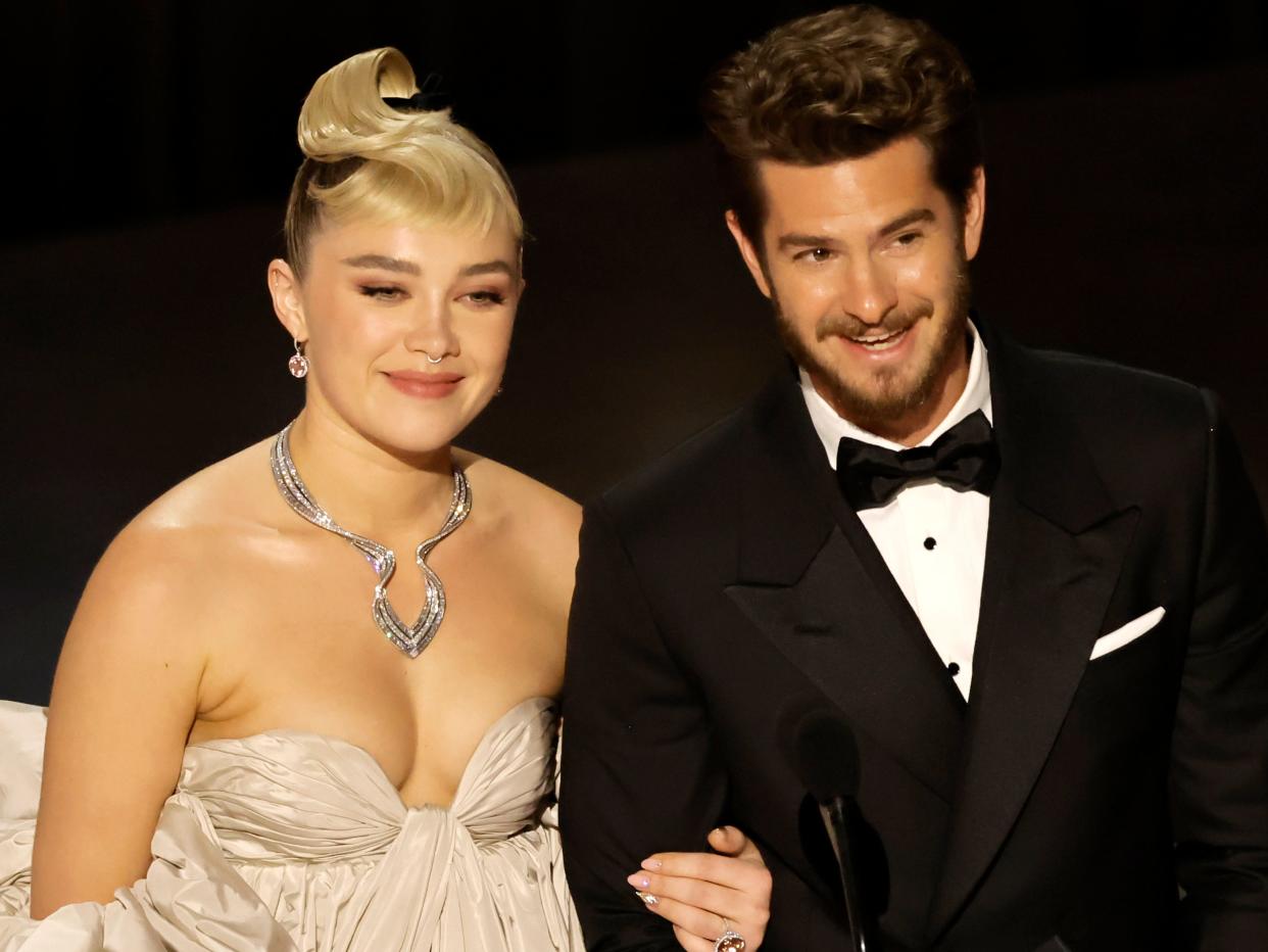 Florence Pugh and Andrew Garfield on stage at the 2023 Oscars.