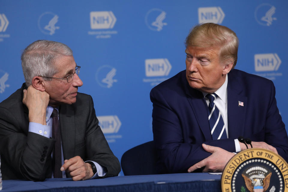 Anthony Fauci, director of the National Institute of Allergy and Infectious Diseases, and President Donald Trump during a briefing on the coronavirus. (Photo: Leah Millis / Reuters)