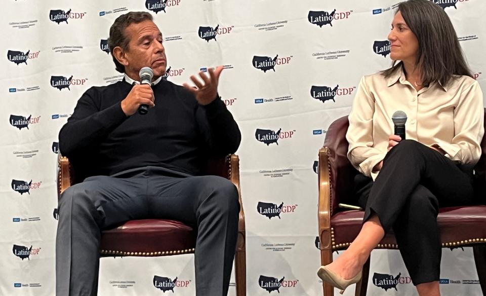 Former Los Angeles mayor Antonion Villaraigosa, left, sat on a panel discussion on Latinos and the economy with Elizabeth Blanco of the Federal Reserve Bank of San Francisco, at UCLA on Wednesday.