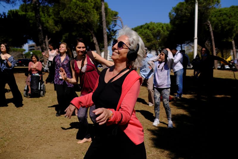 People join socially-distant silent disco in Barcelona