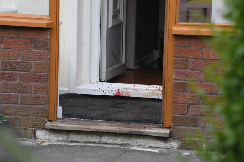 Blood at the entrance of a house in Croxdale Road West