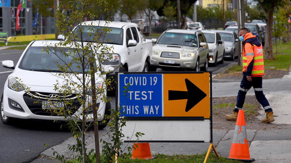 People, pictured here queuing in their cars at a Covid-19 testing station in Melbourne.