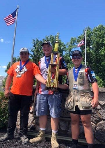 The Buckeye-Chippewa Youth Trap Shooting team of Joseph Prentovich (left), William Browning and Max Hatfield placed first in International Bunker Trap at the Scholastic Clay Target Program Nationals. The squad also was second in skeet.