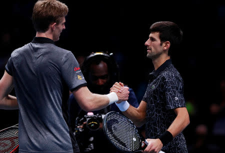 Tennis - ATP Finals - The O2, London, Britain - November 17, 2018 Serbia's Novak Djokovic shakes the hand of South Africa's Kevin Anderson after winning his semi final match Action Images via Reuters/Andrew Couldridge