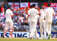 Cricket - Ashes test match - Australia v England - WACA Ground, Perth, Australia, December 17, 2017. Australia's Mitchell Marsh reacts as England's James Anderson celebrates with team mates after a successful LBW appeal during the fourth day of the third Ashes cricket test match. REUTERS/David Gray