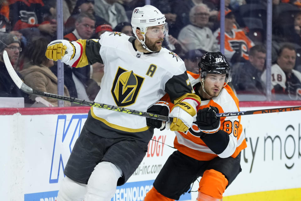 Vegas Golden Knights' Alex Pietrangelo, left, and Philadelphia Flyers' Joel Farabee collide during the second period of an NHL hockey game, Tuesday, March 14, 2023, in Philadelphia. (AP Photo/Matt Slocum)