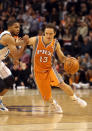 PHOENIX, AZ - DECEMBER 26: Steve Nash #13 of the Phoenix Suns handles the ball against the New Orleans Hornets during the season openning NBA game at US Airways Center on December 26, 2011 in Phoenix, Arizona. The Hornets defeated the Suns 85-84. NOTE TO USER: User expressly acknowledges and agrees that, by downloading and or using this photograph, User is consenting to the terms and conditions of the Getty Images License Agreement. (Photo by Christian Petersen/Getty Images)