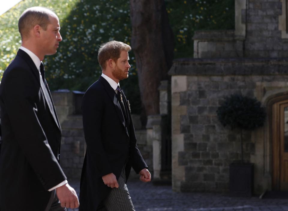 Prince William and Prince Harry follow the coffin during the ceremonial funeral procession of Prince Philip.