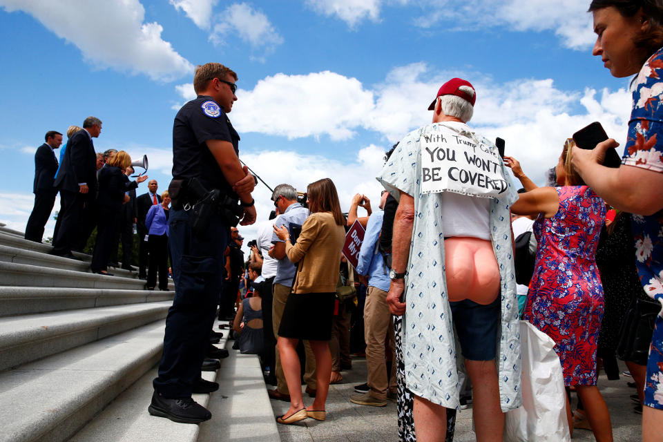 <p>Senate Democrats gather on the Senate steps with protesters on Capitol Hill in Washington, July 25, 2017. (Photo: Eric Thayer/Reuters) </p>