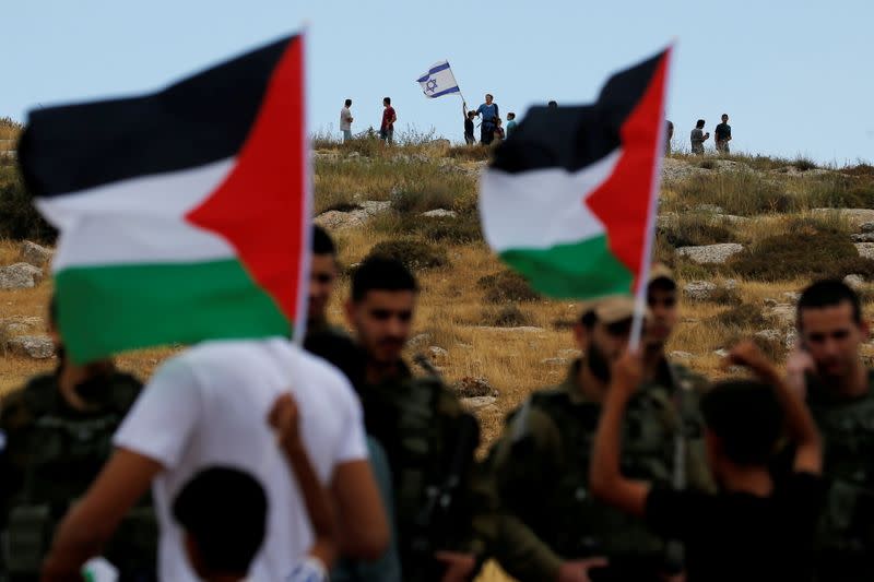 FILE PHOTO: Palestinians protest against Israel's plan to annex parts of the occupied West Bank