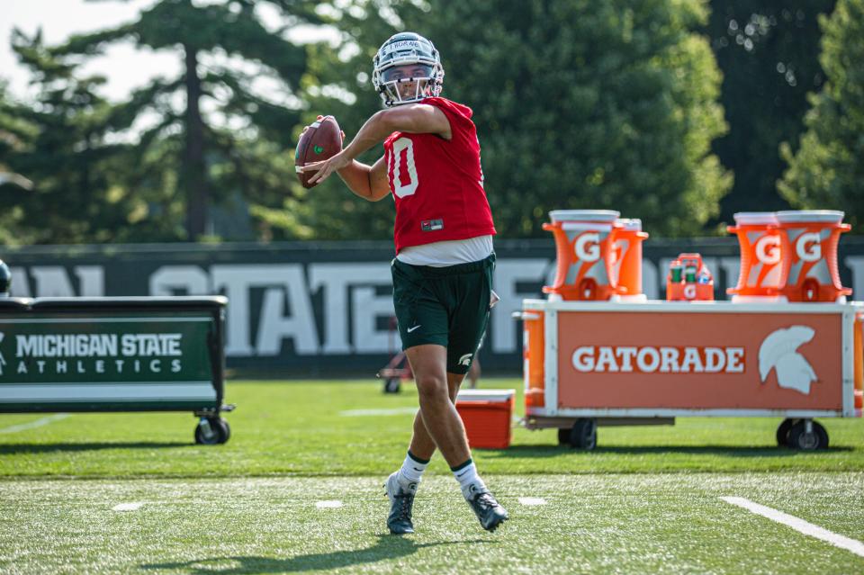 Michigan State redshirt freshman quarterback Payton Thorne goes through drills during an August practice.