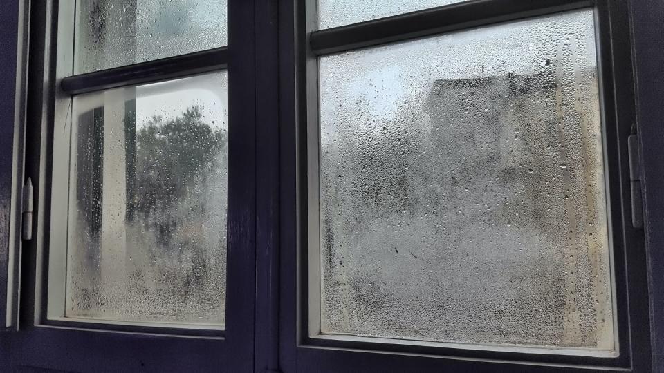 domestic room with rain droplets on window