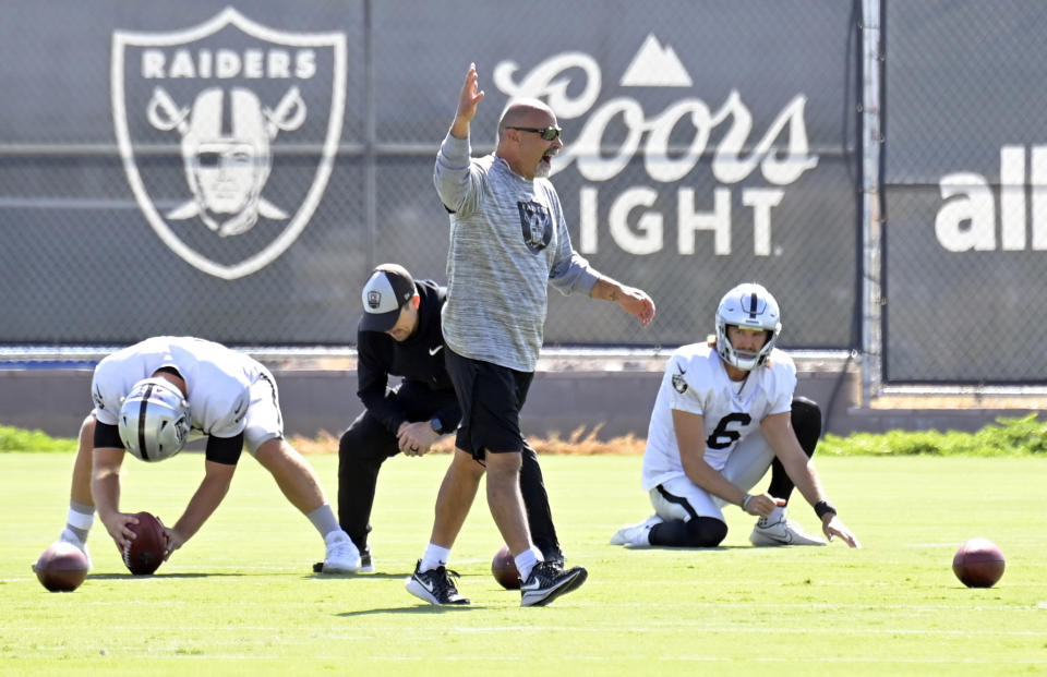 Las Vegas Raiders interim head coach Rich Bisaccia directs a special teams unit during an NFL football practice Wednesday, Oct. 13, 2021, in Henderson. (AP Photo/David Becker)