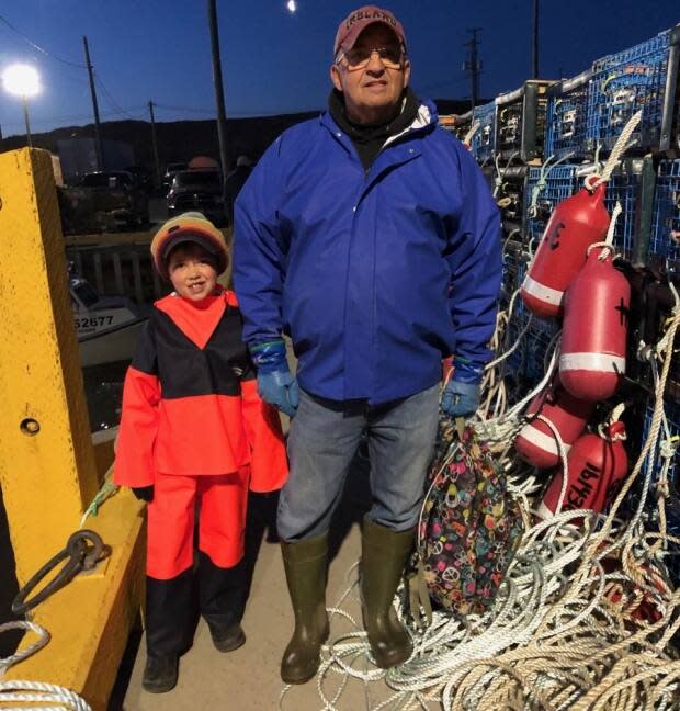 Trent Collins, 7, and his grandfather Keith Daley headed out from the wharf in Stone Haven to set their lobster traps on opening day. Trent has always wanted to join Pa Daley's crew. 