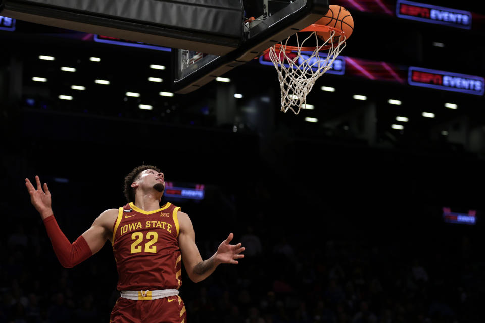 Iowa State's Gabe Kalscheur watches his layup fall in the basket during the first half of the team's NCAA college basketball game against Memphis in the NIT Season Tip-Off tournament Friday, Nov. 26, 2021, in New York. (AP Photo/Adam Hunger)