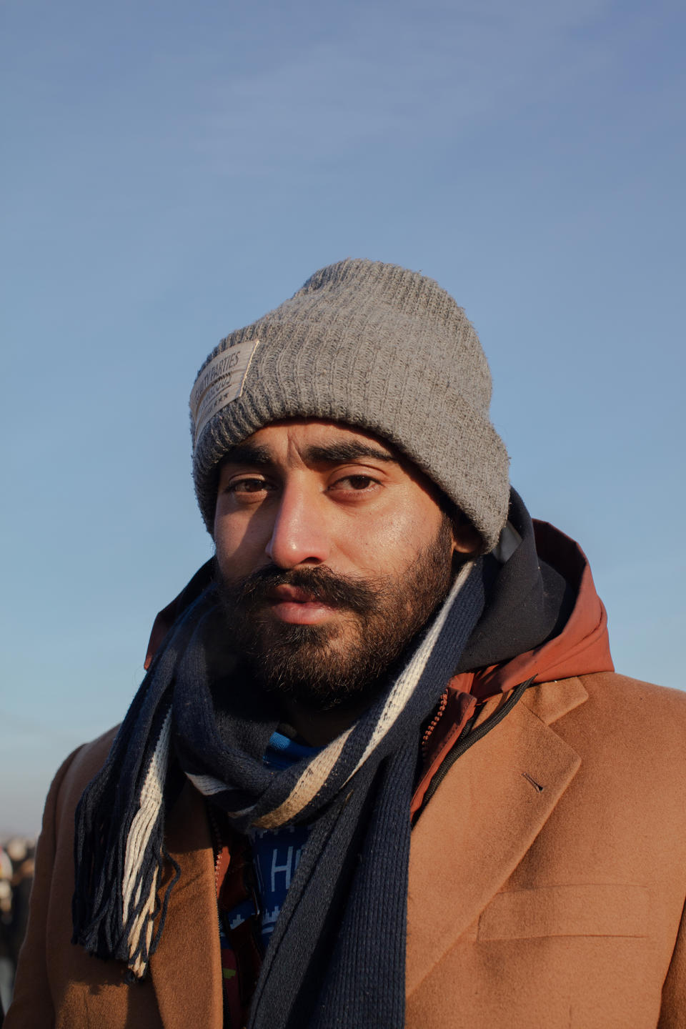 Parvinder Singh from India said he spent three days waiting to cross the border without food, water, or sleep, while white Ukrainians passed through much more quickly<span class="copyright">Natalie Keyssar for TIME</span>