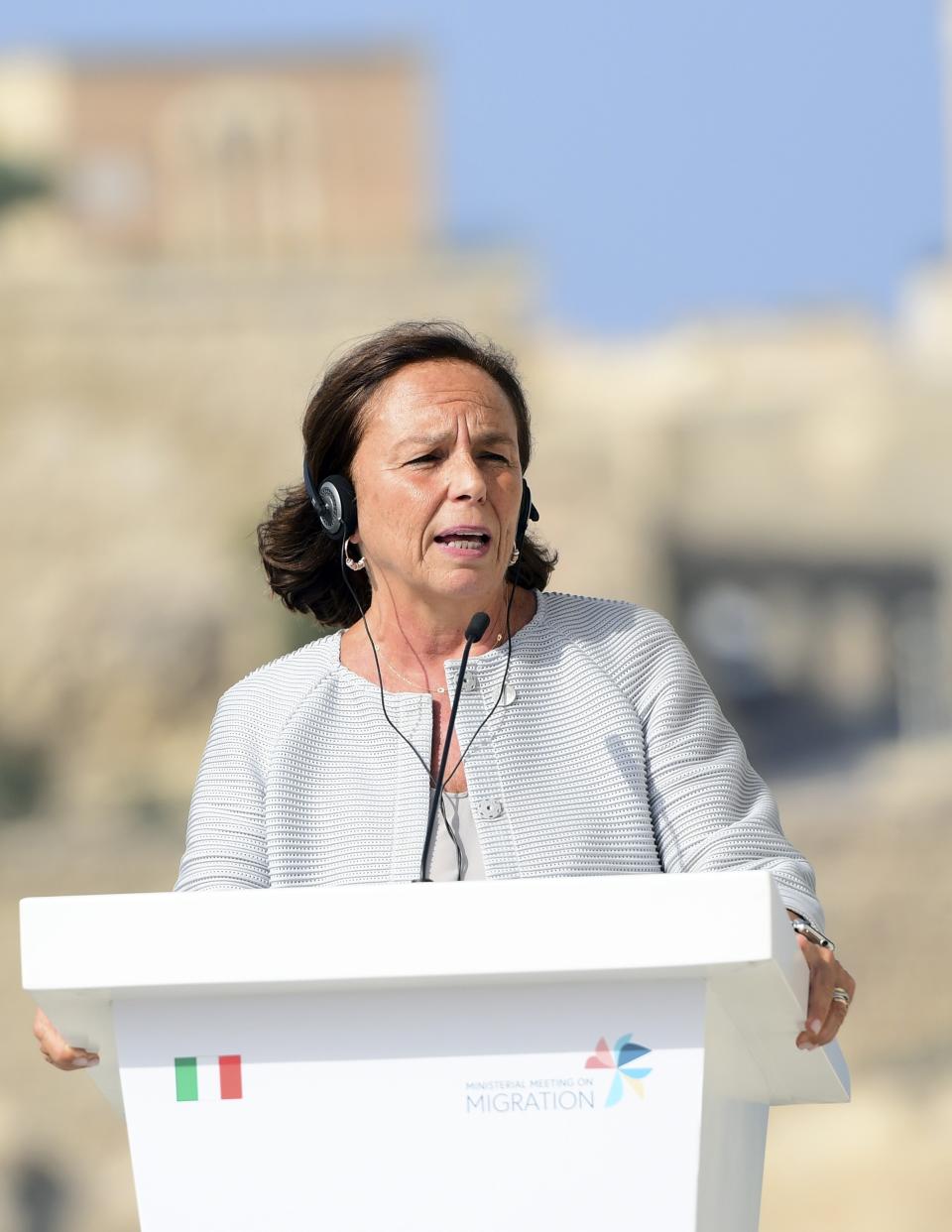 Italian Interior Minister Luciana Lamorgese speaks during a joint press conference at the end of an informal meeting of EU interior ministers, at Fort St. Angelo, in Birgu, Malta, Monday, Sept. 23, 2019. Five European Union nations have agreed to a temporary arrangement to take in migrants rescued from the central Mediterranean Sea. (AP Photo/Jonathan Borg)