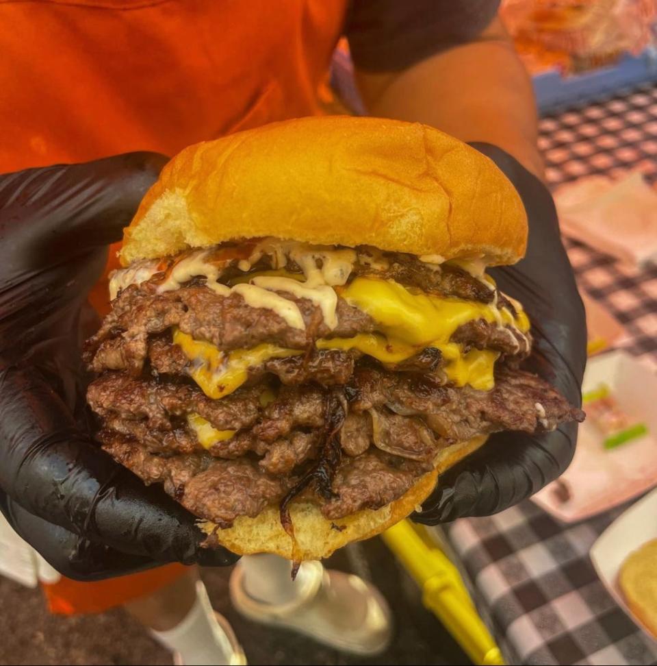 A six-patty burger from the Only Doubles Burger Pop-up. As its name implies, Only Doubles only serves double-patty burgers, but customers can stack those doubles as high as they dare.