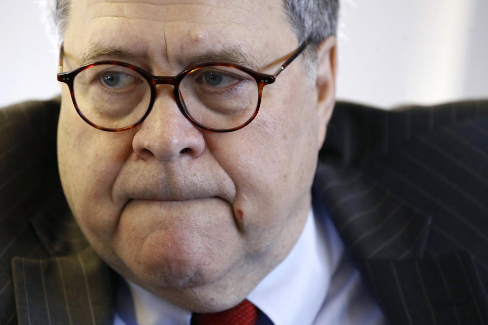 Attorney General William Barr speaks with an Associated Press reporter onboard an aircraft en route to Cleveland, Thursday, Nov. 21, 2019, during a two-day trip to Ohio and Montana. (AP Photo/Patrick Semansky)