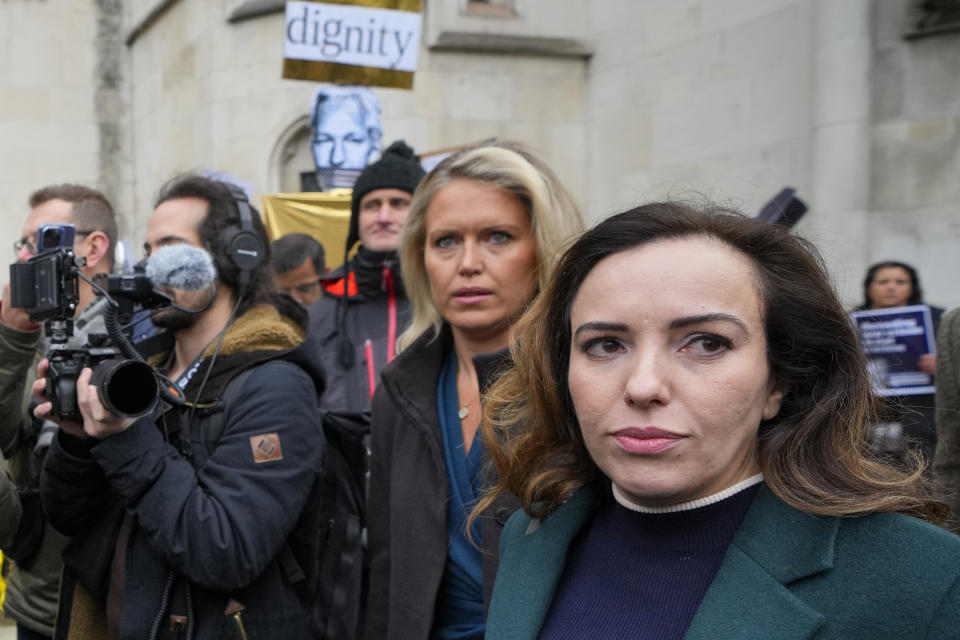 Stella Assange, foreground right, wife of Julian Assange arrives at the Royal Courts of Justice in London, Tuesday, Feb. 20, 2024. WikiLeaks founder Julian Assange will make his final appeal against his impending extradition to the United States at the court. (AP Photo/Kirsty Wigglesworth)