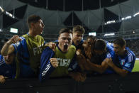 Italy's players celebrate their side's 2nd goal scored by teammate Cesare Casadei from the penalty spot during a FIFA U-20 World Cup round of 16 soccer match against England at La Plata Stadium in La Plata, Argentina, Wednesday, May 31, 2023. (AP Photo/Ivan Fernandez)