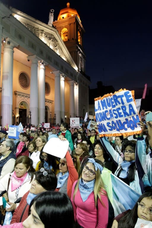 Demonstrators march against efforts to legalize abortion, outside Tucuman Cathedral in northern Argentina in June 2018